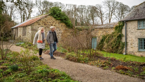 Visitors walking and exploring the garden at Godolphin